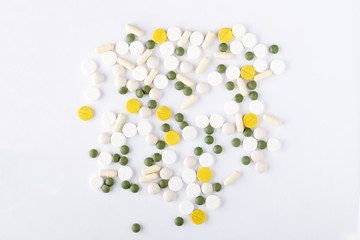Many pills on white background isolated