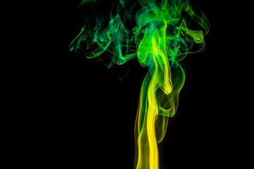 Obraz premium Colored smoke on black background