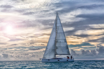 sailboat at sunset in navigation, sail boat