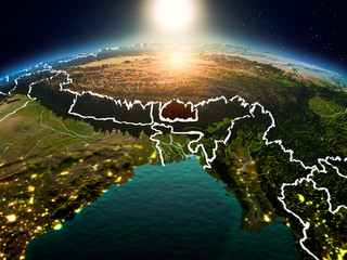 Bhutan in sunrise from orbit