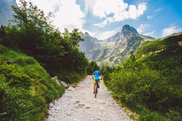 Obraz premium a cyclist riding in the high Tatras, Slovakia