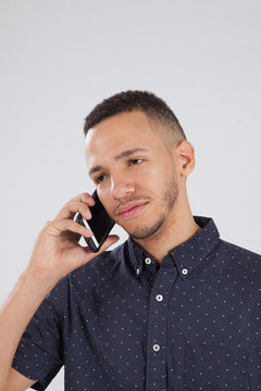 Hispanic Man Talking On A Cell Phone