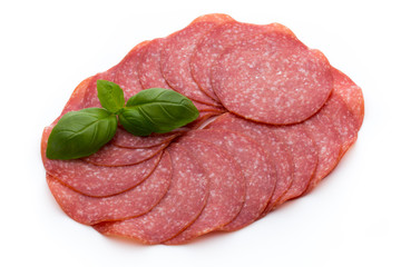 Salami slices isolated on white background.