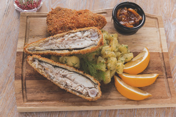 fish roasted in breadcrumbs flounder with boiled potatoes