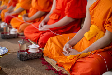 Close up of Thai monk in wedding ceremony