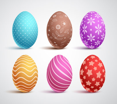 Easter eggs vector set with colors and patterns. Elements and decorations with 3D realistic effect for easter celebration isolated in white background. Vector illustration.
