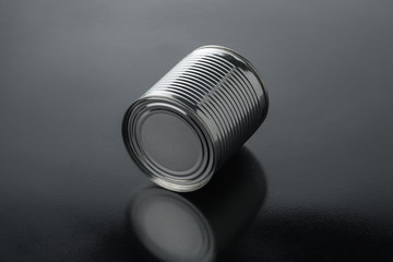 Closeup various metal tin can on black background