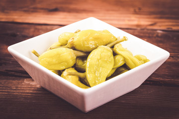pickled golden greek pepper or friggitelli pepper