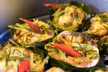 Steamed fish with curry paste.