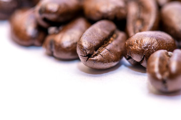 Coffee beans closeup on white background

