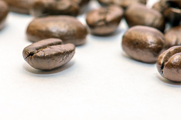 Coffee beans closeup on white background

