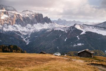 Wooden cottage in dolomities alps Italy