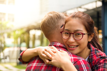 happy young couple in love hug and looking camera and smiling, couple concept, valentine's day concept