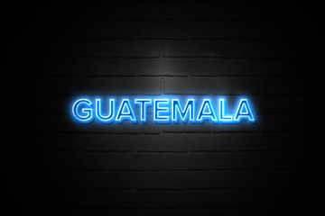Obraz premium Guatemala neon Sign on brickwall