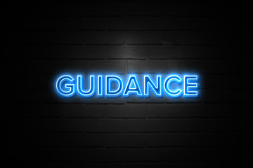 Obraz premium Guidance neon Sign on brickwall