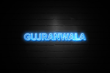 Gujranwala neon Sign on brickwall