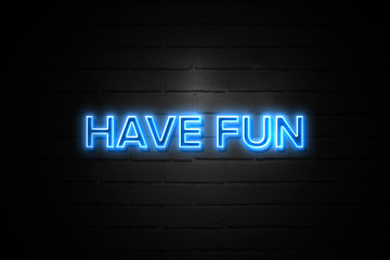 Obraz premium Have Fun neon Sign on brickwall