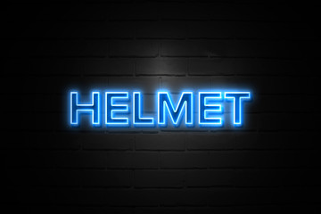 Obraz premium Helmet neon Sign on brickwall
