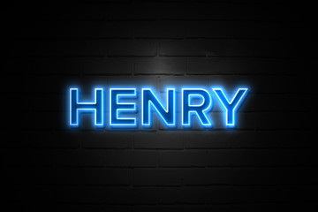 Obraz premium Henry neon Sign on brickwall