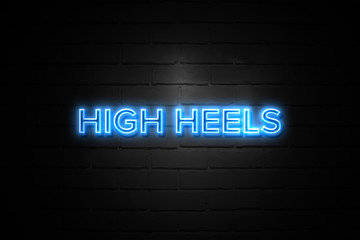 Fototapeta premium High Heels neon Sign on brickwall