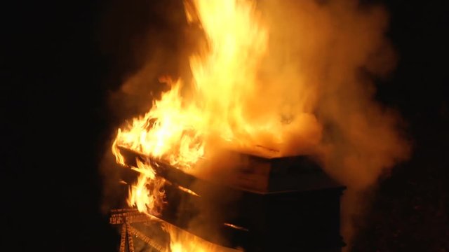 Coffin burns at night