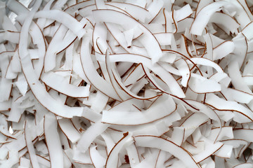 Coconut flakes pattern background.