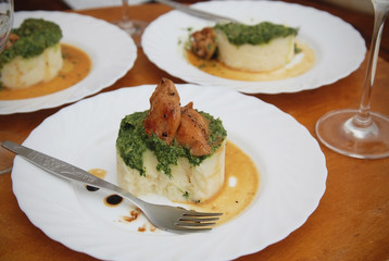 Food. Roast or Baked Chicken Meat with Spinach and Mashed Potatoes on Round Table. Homemade Food. Dinner.