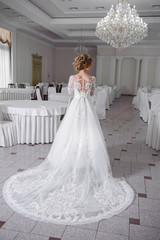 Fototapeta premium Beautiful bride in wedding dress 