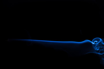 Blue and white smoke isolated on black background