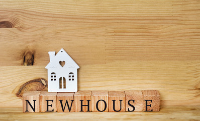 Obraz na płótnie Canvas New Home Concept with White Wooden Small Houses