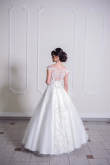 Naklejka premium Beautiful bride in wedding dress