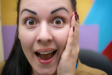 A young girl in the workplace. Working process. Decorator.