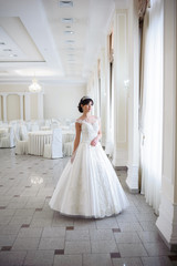 Naklejka premium Beautiful bride in wedding dress