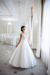Fototapeta premium Beautiful bride in wedding dress