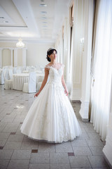 Fototapeta premium Beautiful bride in wedding dress