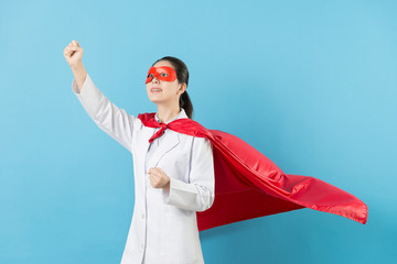 pretty female clinic doctor dress up as superhero