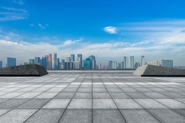 empty brick floor with cityscape and skyline.