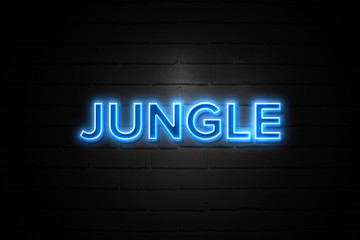 Obraz premium Jungle neon Sign on brickwall