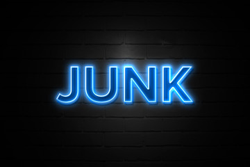Fototapeta na wymiar Junk neon Sign on brickwall