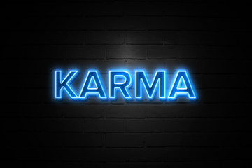 Karma neon Sign on brickwall - obrazy, fototapety, plakaty