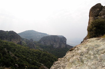 Amazing terrain in Meteora valley, Greece / one of most popular Mediterranean tourist routes. A stronghold of Orthodox Christianity. It is famous for its unique rocky landscape and places of worship 