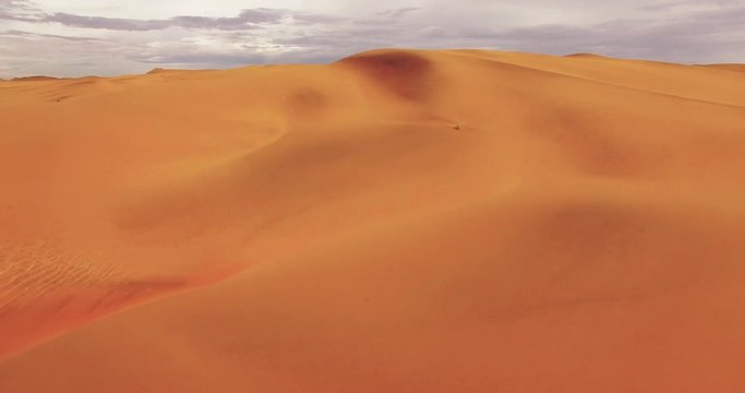 4K aerial view of endless sand dunes of the Namib desert inside the Namib-Naukluft National Park