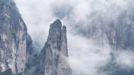 Beautiful mountains landscapes surrounded by white fog, xianju, zhejiang province, China.