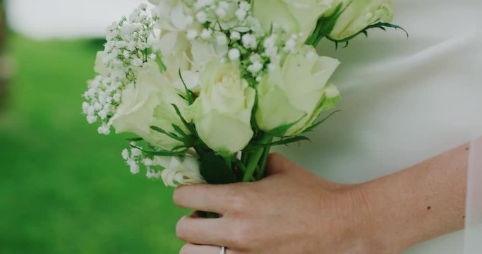 Beautiful bride with flower bouquet on wedding day