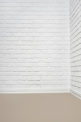 the corner of the room with white brick wall and floor, abstract background photo