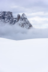 Dolomites. Winter views in the fog and low clouds