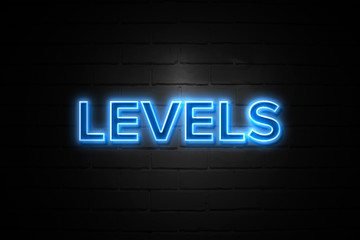 Levels neon Sign on brickwall