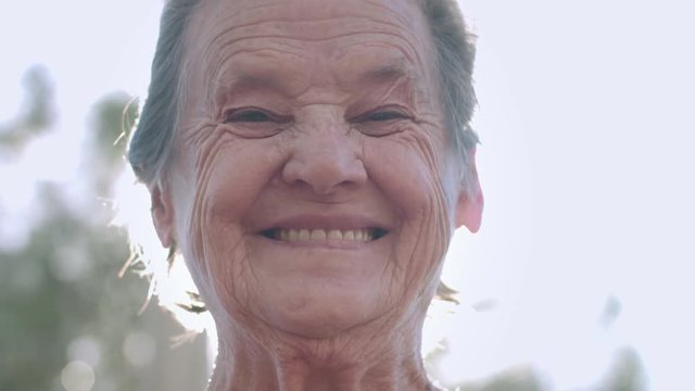 Closeup portrait of beautiful face older woman