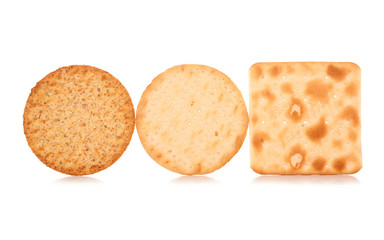 three cracker biscuits on white background