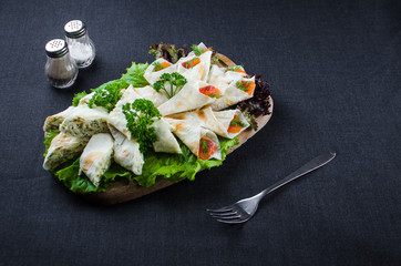 Roll in lavash wrapped salmon with Philadelphia cheese